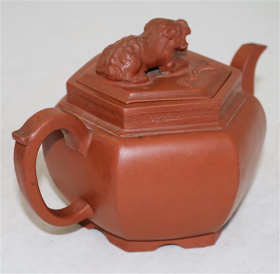 A Chinese Yixing hexagonal teapot and cover, 18th century, height 12.5cm, loss to sprig on cover